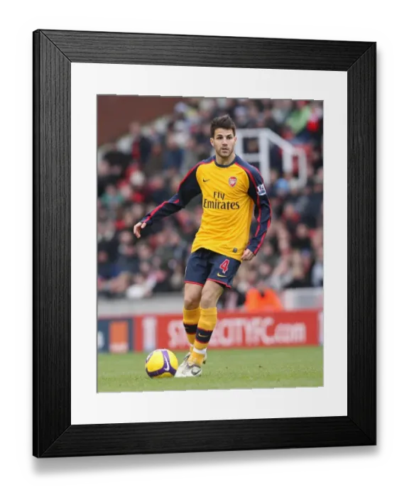 Framed Print : Cesc Fabregas: Masterminding Arsenal's 1-2 Victory over Stoke City, 2008 Framed Print : Cesc Fabregas: Masterminding Arsenal's 1-2 Victory over Stoke City, 2008
