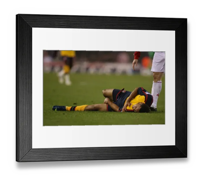 Framed Print : Theo Walcott's Injury: Arsenal's 2-1 Win Over Stoke City, 2008 Framed Print : Theo Walcott's Injury: Arsenal's 2-1 Win Over Stoke City, 2008