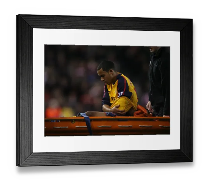 Framed Print : Theo Walcott's Injury: Arsenal's Victory Over Stoke (2008) Framed Print : Theo Walcott's Injury: Arsenal's Victory Over Stoke (2008)