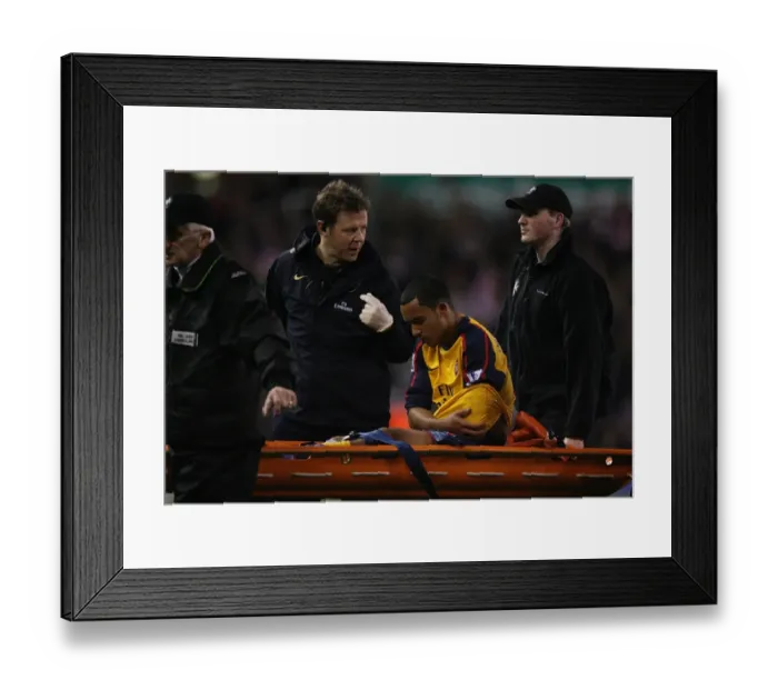 Framed Print : Theo Walcott's Injury Marrs Arsenal's Hard-Fought 2-1 Victory Over Stoke, 2008
