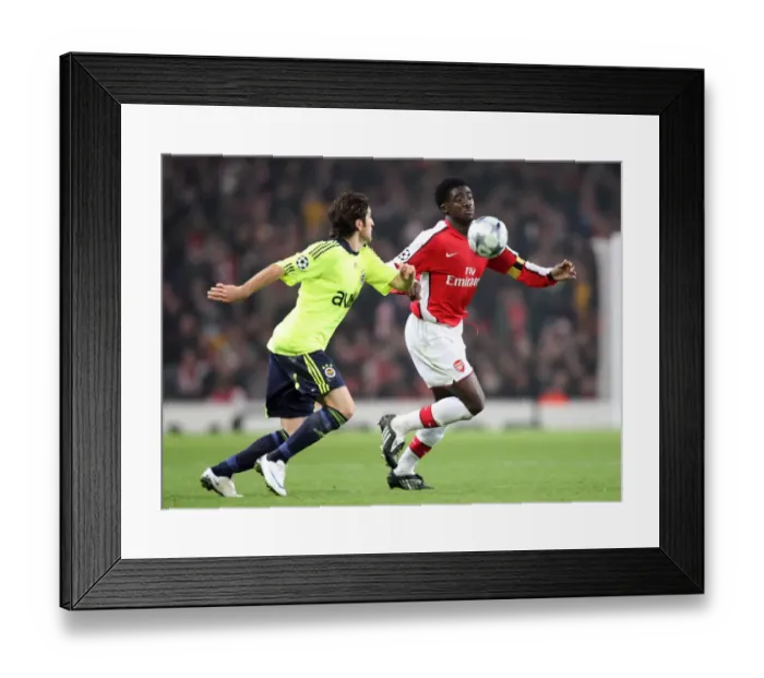 Framed Print : Kolo Toure (Arsenal) Ugur Boral (Fenerbahce)