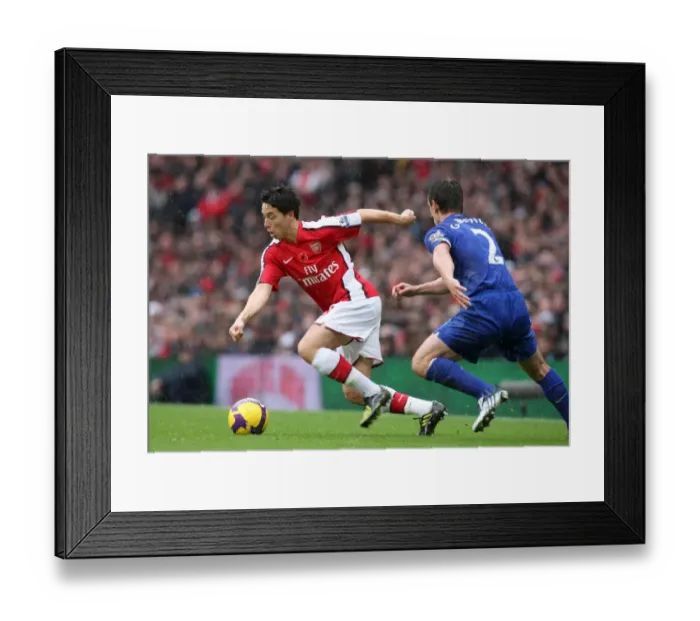 Framed Print : Samir Nasri (Arsenal) Gary Neville (Man Utd) Framed Print : Samir Nasri (Arsenal) Gary Neville (Man Utd)