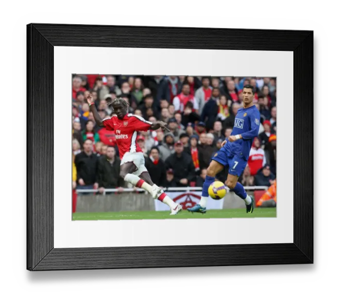 Framed Print : Bacary Sagna (Arsenal) Christiano Ronaldo (Man Utd)