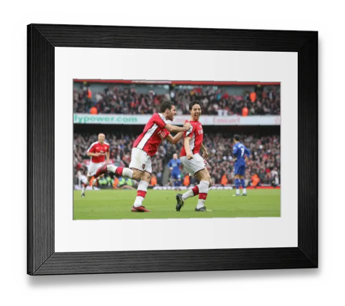 Framed Print : Arsenal's Unstoppable Duo: Nasri and Fabregas Celebrate Victory Over Manchester United Framed Print : Arsenal's Unstoppable Duo: Nasri and Fabregas Celebrate Victory Over Manchester United
