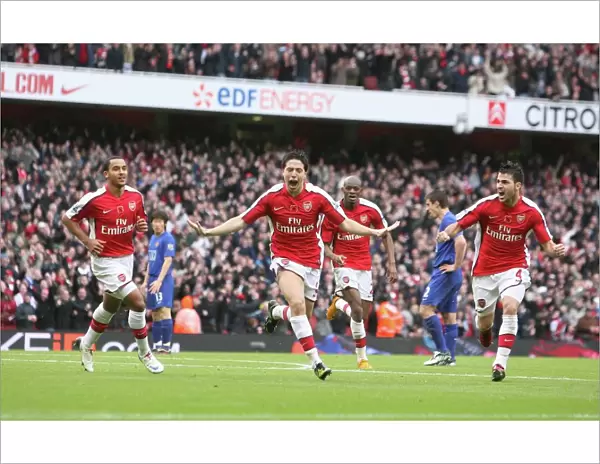 Samir Nasri celebrates scoring the 2nd Arsenal goal