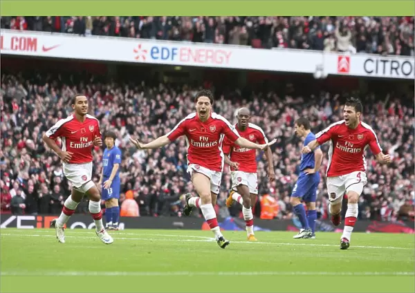 Samir Nasri celebrates scoring the 2nd Arsenal goal