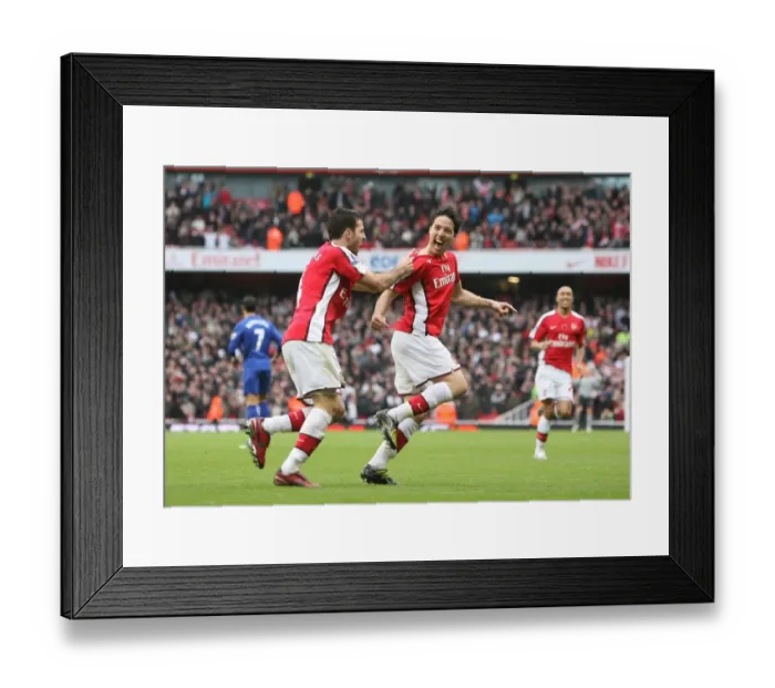 Framed Print : Arsenal's Unstoppable Duo: Nasri and Fabregas's Goal Celebration vs. Manchester United (2008) Framed Print : Arsenal's Unstoppable Duo: Nasri and Fabregas's Goal Celebration vs. Manchester United (2008)