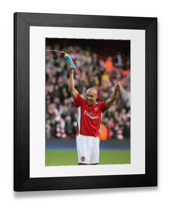Framed Print : Mikael Slivestre (Arsenal) celebrates after the match