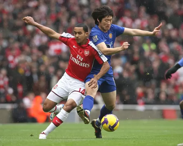 The Clash of Stars: Walcott vs. Park in Arsenal's 2-1 Victory over Manchester United, 2008