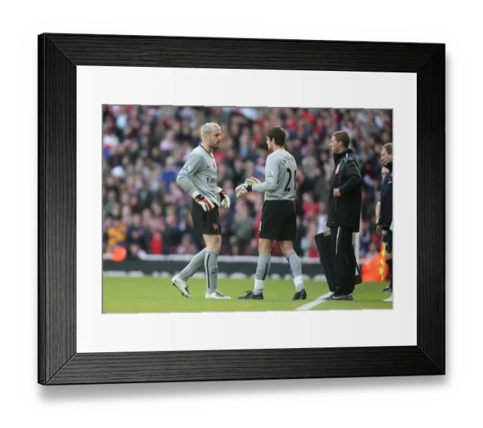Framed Print : Almunia Injured: Fabianski Steps Up as Arsenal Edge Manchester United 2-1