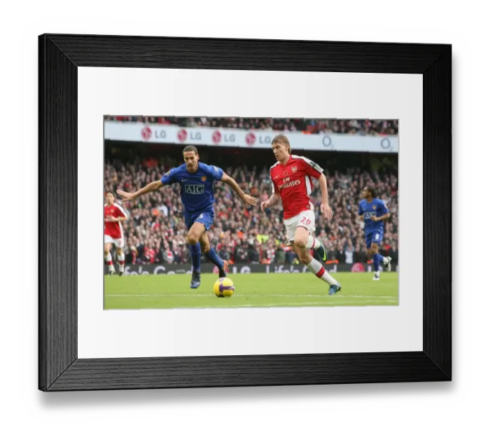 Framed Print : Nicklas Bendtner (Arsenal) Rio Ferdinand (Manchester United) Framed Print : Nicklas Bendtner (Arsenal) Rio Ferdinand (Manchester United)