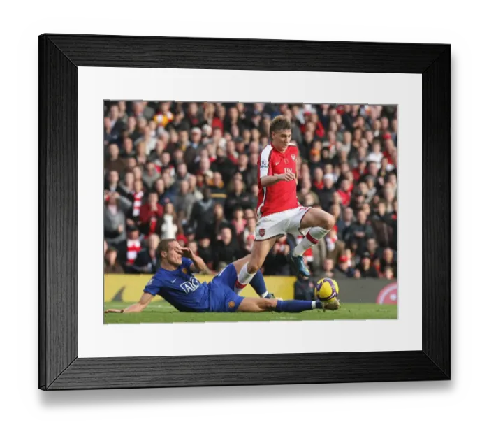 Framed Print : Nicklas Bendtner (Arsenal) Nemanja Vidic (Manchester United) Framed Print : Nicklas Bendtner (Arsenal) Nemanja Vidic (Manchester United)