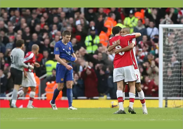 Gael Clichy and Samir Nasri celebrate the Arsenal victory