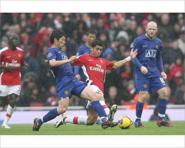 Denilson (Arsenal) Ji Sung Park (Manchester United)
