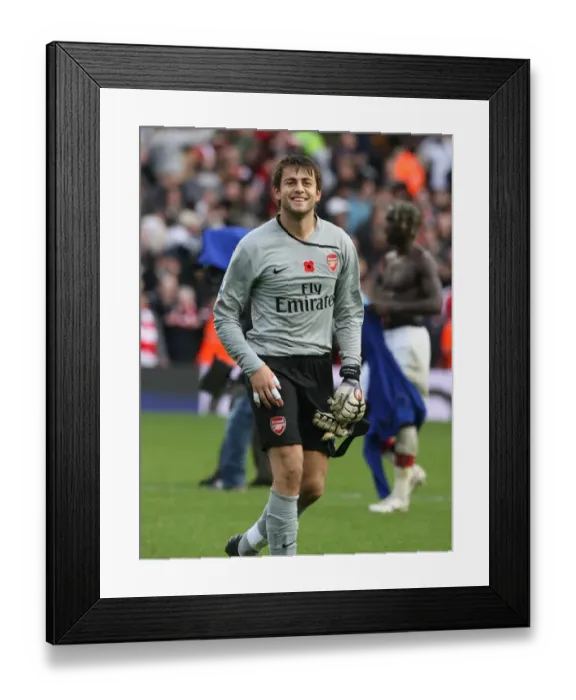 Framed Print : Arsenal goalkeeper Lucasz Fabianski celebrates after the match Framed Print : Arsenal goalkeeper Lucasz Fabianski celebrates after the match