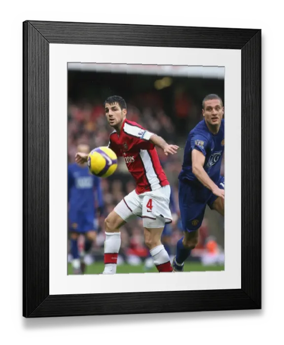 Framed Print : Cesc Fabregas (Arsenal) Nemanja Vidic (Manchester United) Framed Print : Cesc Fabregas (Arsenal) Nemanja Vidic (Manchester United)