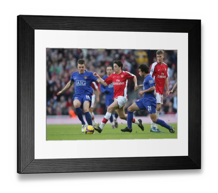 Framed Print : Samir Nasri (Arsenal) Michael Carrick and Rafael (Manchester United) Framed Print : Samir Nasri (Arsenal) Michael Carrick and Rafael (Manchester United)