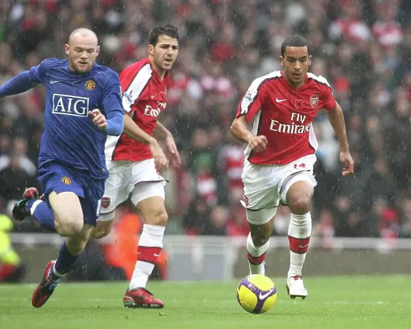Theo Walcott (Arsenal) Wayne Rooney (Manchester United)