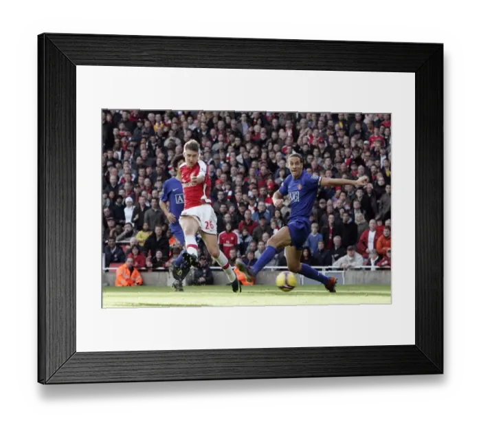 Framed Print : Arsenal's Bendtner vs. Manchester United's Ferdinand: A Rivalry Ignites in the 2008 Barclays Premier League Clash at Emirates Stadium (2:1 in Favor of Arsenal) Framed Print : Arsenal's Bendtner vs. Manchester United's Ferdinand: A Rivalry Ignites in the 2008 Barclays Premier League Clash at Emirates Stadium (2:1 in Favor of Arsenal)