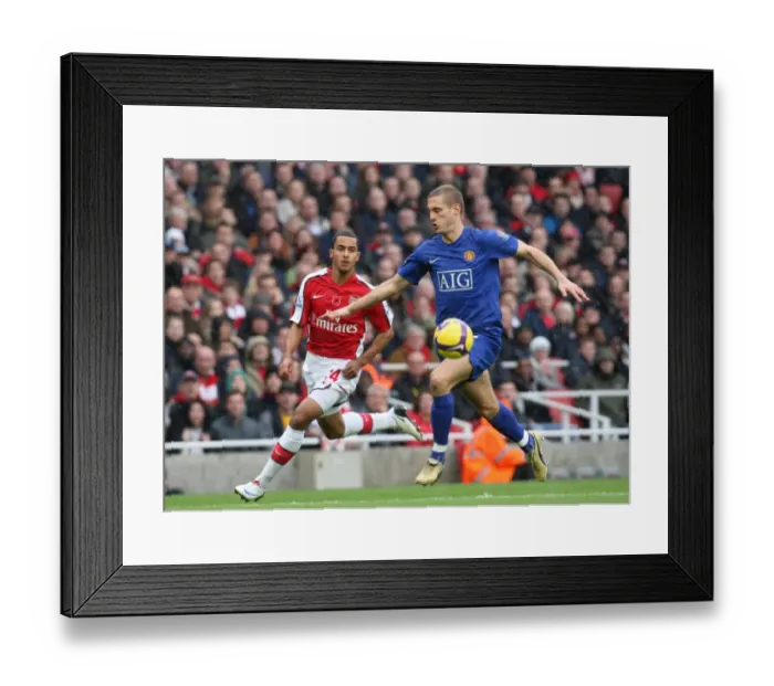 Framed Print : Theo Walcott (Arsenal) Nemanja Vidic (Man Utd) Framed Print : Theo Walcott (Arsenal) Nemanja Vidic (Man Utd)