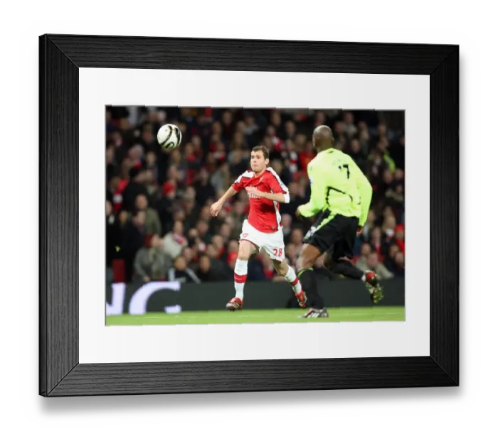 Framed Print : Amaury Bischoff's Triumph: Arsenal's 3-0 Victory Over Wigan Athletic in Carling Cup Framed Print : Amaury Bischoff's Triumph: Arsenal's 3-0 Victory Over Wigan Athletic in Carling Cup