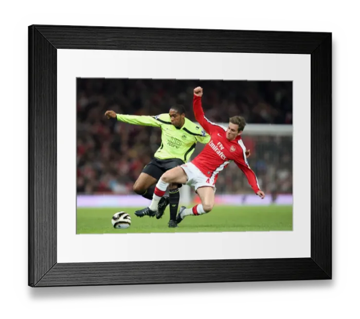 Framed Print : Arsenal's Triumph: Mark Randall's Dominance Over Wilson Palacios in the Carling Cup Clash (3-0) Framed Print : Arsenal's Triumph: Mark Randall's Dominance Over Wilson Palacios in the Carling Cup Clash (3-0)