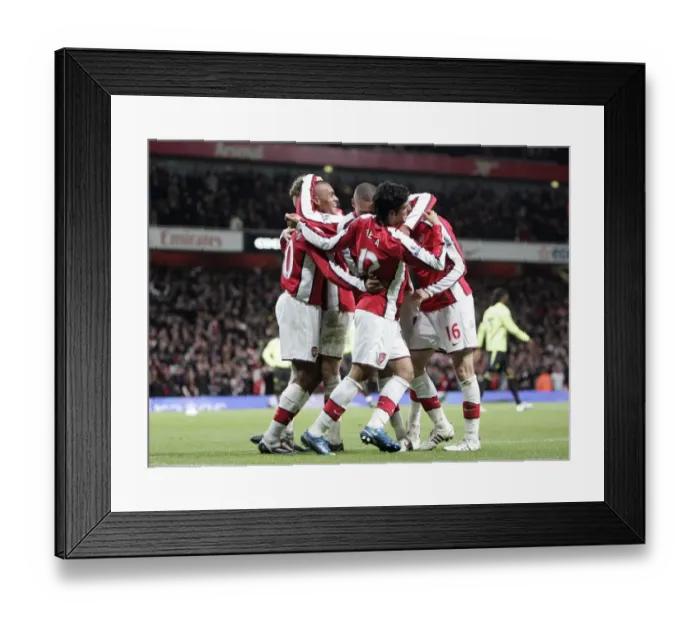 Framed Print : Jay Simpson's Brace: Arsenal's Dominant 3-0 Win Over Wigan Athletic in Carling Cup