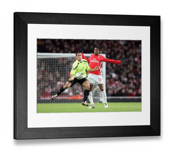 Framed Print : Alex Song (Arsenal) Amr Zaki (Wigan) Framed Print : Alex Song (Arsenal) Amr Zaki (Wigan)