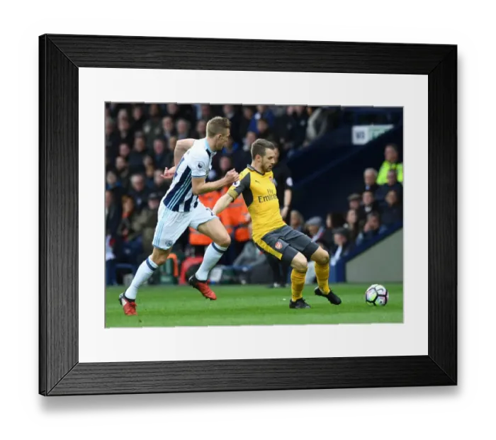 Framed Print : Clash of Midfielders: Ramsey vs. Fletcher - West Bromwich Albion vs. Arsenal, Premier League Framed Print : Clash of Midfielders: Ramsey vs. Fletcher - West Bromwich Albion vs. Arsenal, Premier League