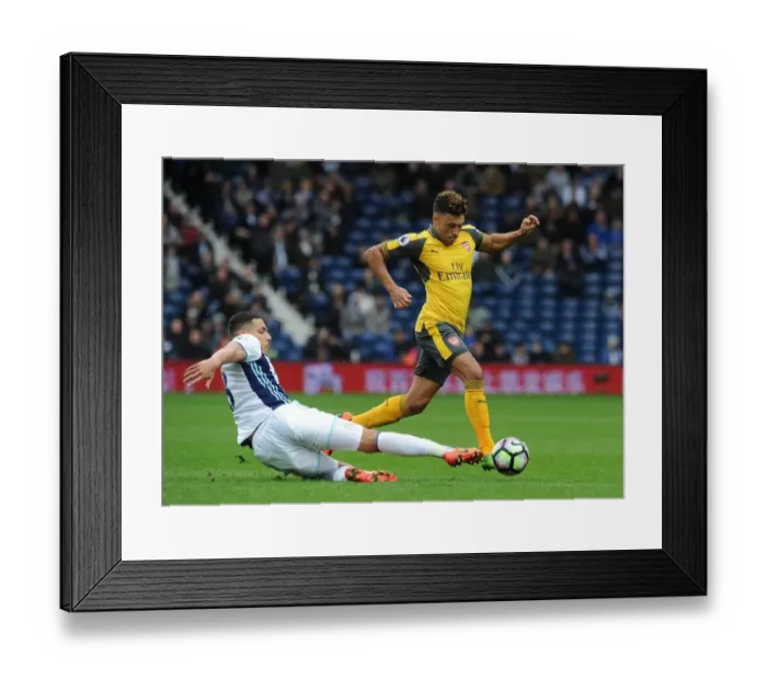 Framed Print : Arsenal's Alex Oxlade-Chamberlain Faces Off Against West Bromwich Albion's Jake Livermore