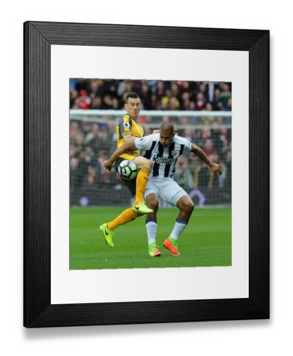 Framed Print : Koscielny vs Rondon: A Premier League Battle - Clash at The Hawthorns (West Bromwich Albion vs Arsenal 2016-17)
