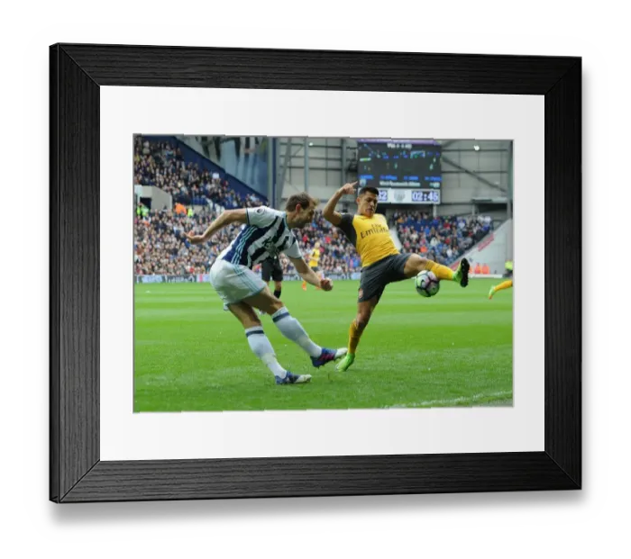 Framed Print : Arsenal's Alexis Sanchez Closes In on West Brom's Craig Dawson in Intense Premier League Clash