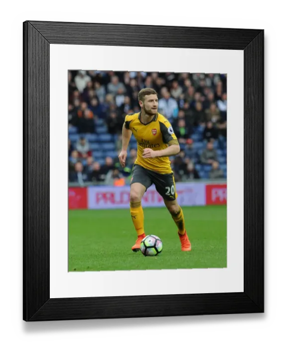 Framed Print : Shkodran Mustafi Focuses in Arsenal's Premier League Clash Against West Bromwich Albion