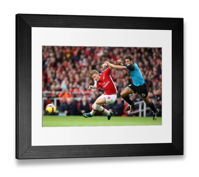 Framed Print : Nicklas Bendtner (Arsenal) Curtis Davies (Villa)