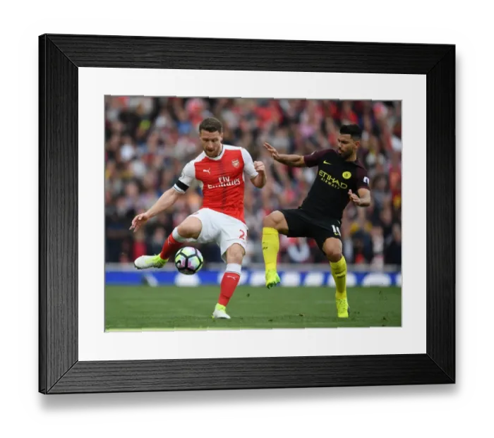 Framed Print : Clash of the Titans: Mustafi vs. Aguero - Arsenal vs. Manchester City Showdown Framed Print : Clash of the Titans: Mustafi vs. Aguero - Arsenal vs. Manchester City Showdown