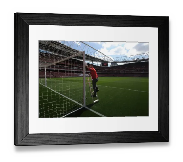 Framed Print : Preparing the Turf: Arsenal v Manchester City, Premier League 2016-17
