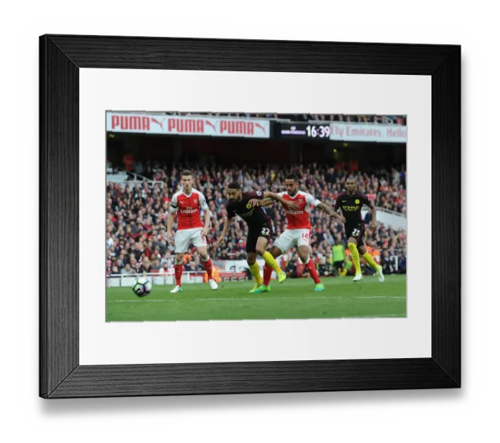 Framed Print : Theo Walcott Scores Dramatic Goal Against Manchester City in Premier League Showdown Framed Print : Theo Walcott Scores Dramatic Goal Against Manchester City in Premier League Showdown