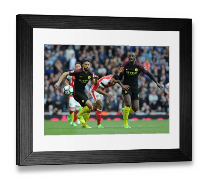Framed Print : Theo Walcott vs Yaya Toure and Gael Clichy: Intense Battle at Arsenal vs Manchester City, Premier League 2016-17