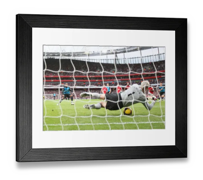 Framed Print : Arsenal goalkeeper Manuel Almunia save a penalty from Ashley Young Framed Print : Arsenal goalkeeper Manuel Almunia save a penalty from Ashley Young