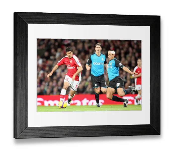 Framed Print : Carlos Vela (Arsenal) Curtis Davies (Aston Villa)