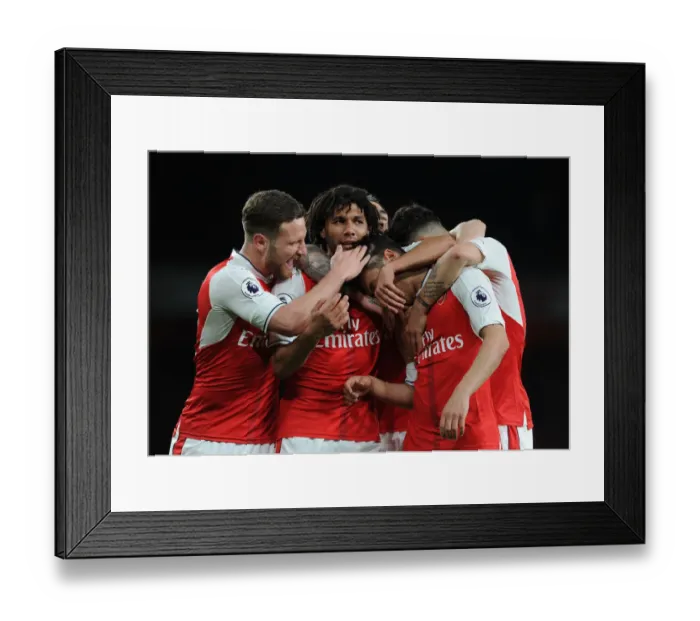 Framed Print : Arsenal's Mesut Ozil, Mohamed Elneny, and Shkodran Mustafi Celebrate Goal vs West Ham United (2016-17)