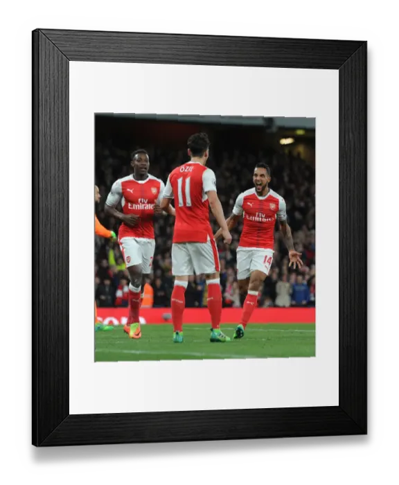 Framed Print : Arsenal's Theo Walcott, Danny Welbeck, and Mesut Ozil Celebrate Goals Against West Ham United