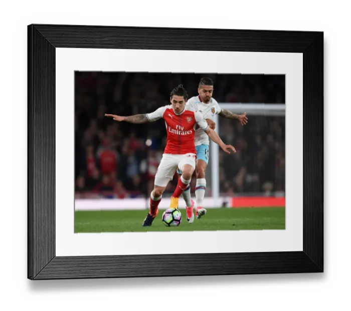Framed Print : Bellerin vs Lanzini: Intense Battle in Arsenal v West Ham United Premier League Clash