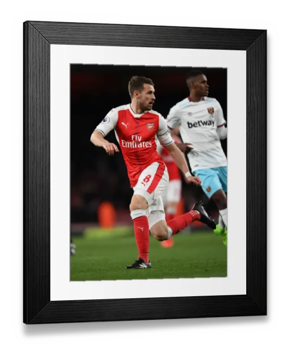 Framed Print : Aaron Ramsey in Action: Arsenal vs West Ham United, Premier League 2016-17 Framed Print : Aaron Ramsey in Action: Arsenal vs West Ham United, Premier League 2016-17