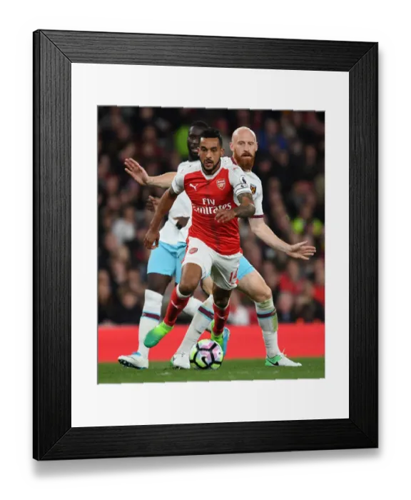 Framed Print : Theo Walcott vs. James Collins: A Premier League Battle at Arsenal Framed Print : Theo Walcott vs. James Collins: A Premier League Battle at Arsenal