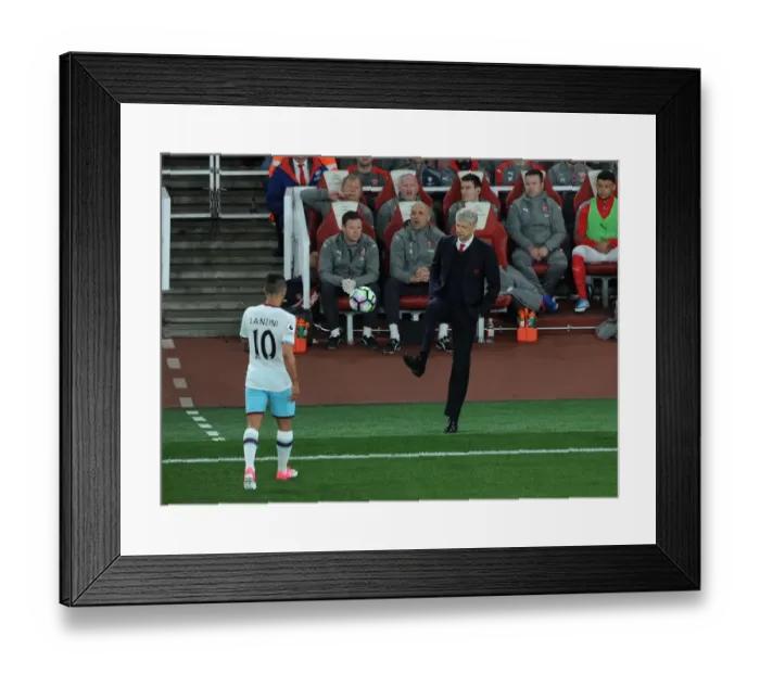 Framed Print : Arsene Wenger vs. Manuel Lanzini: A Battle in the Premier League between Arsenal and West Ham United