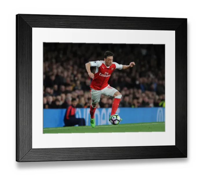Framed Print : Mesut Ozil (Arsenal). Arsenal 3: 0 West Ham United. Premier League. Emirates Stadium