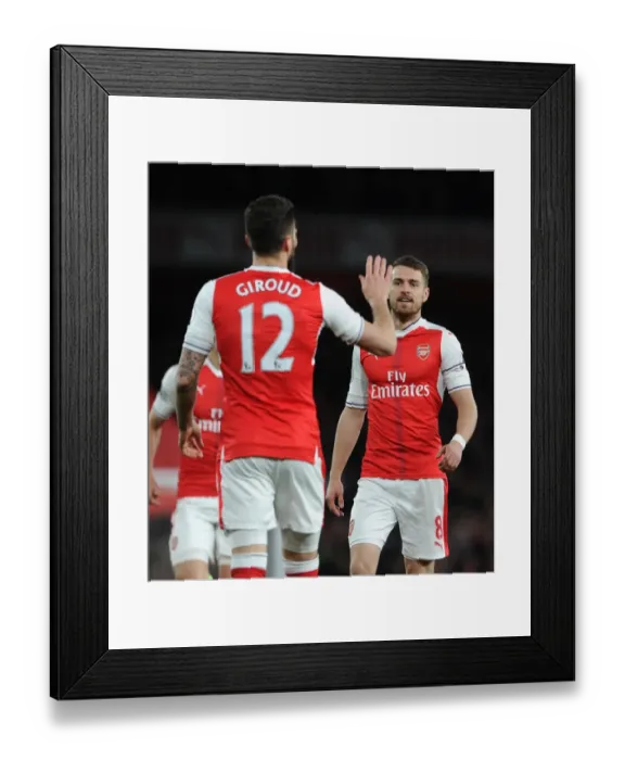 Framed Print : Aaron Ramsey (Arsenal). Arsenal 3: 0 West Ham United. Premier League. Emirates Stadium Framed Print : Aaron Ramsey (Arsenal). Arsenal 3: 0 West Ham United. Premier League. Emirates Stadium