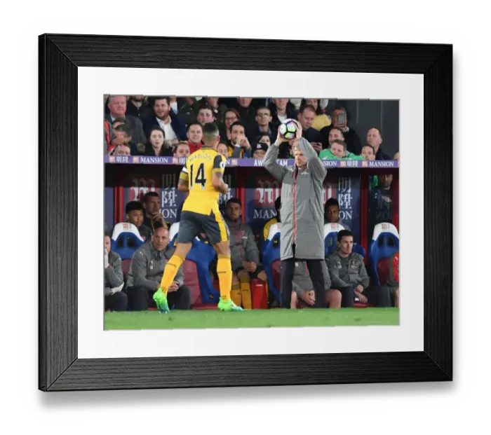 Framed Print : Arsene Wenger Gives the Ball to Theo Walcott during Arsenal's Premier League Clash against Crystal Palace
