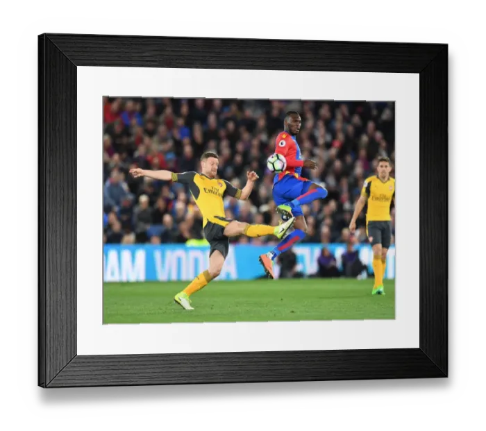 Framed Print : Mustafi vs Benteke: Intense Battle in Crystal Palace vs Arsenal Premier League Clash Framed Print : Mustafi vs Benteke: Intense Battle in Crystal Palace vs Arsenal Premier League Clash